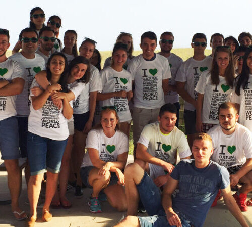 Work and Travel participants help clean local beach