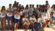 Work and Travel participants help clean local beach