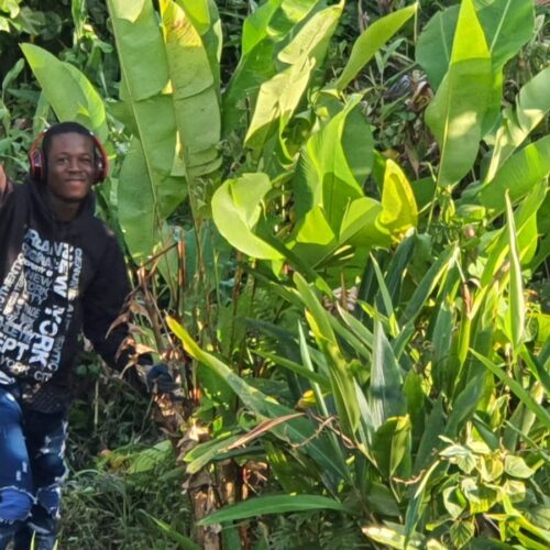 A First Time Traveler from Haiti Volunteers in Puerto Rico To Help With Hurricane Relief